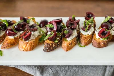 Goat Cheese Bruschetta With Fresh Cherries And Mint