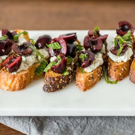 Goat Cheese Bruschetta With Fresh Cherries And Mint