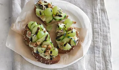 Toast With Pesto Spread, Grapes, Cucumber, And Walnuts
